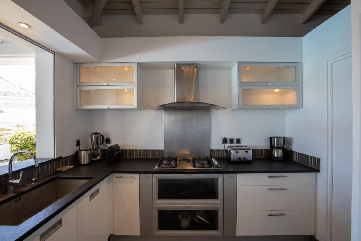 Property of 2 villas with sea view in Terres Basses