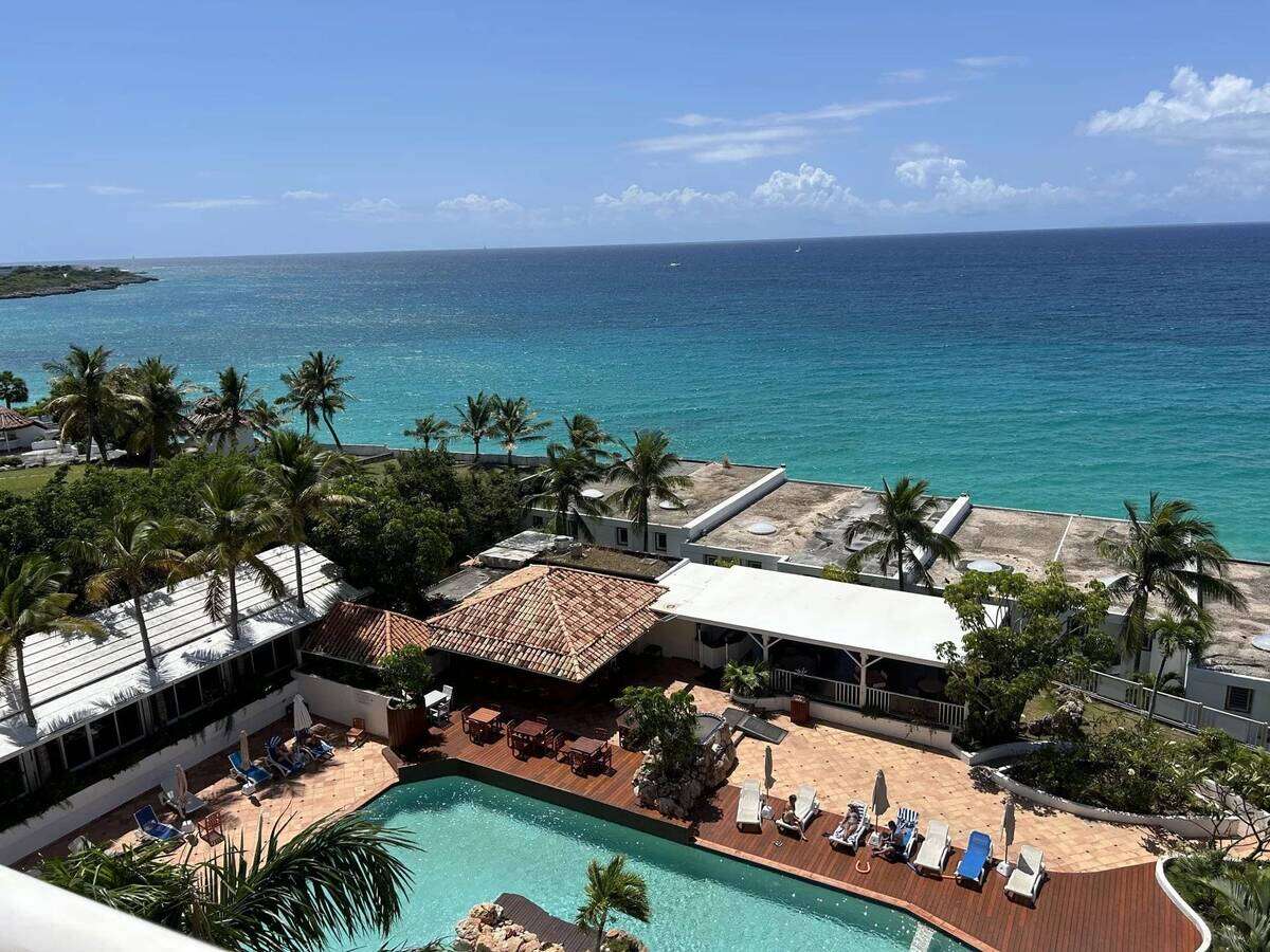 Photo Un bijou d'appartement sur la plage .