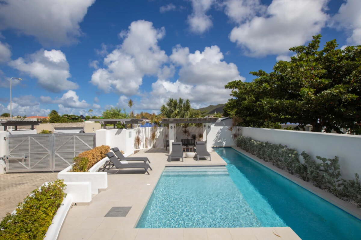 Luxury Beachfront Living at Aqualina Beach Club