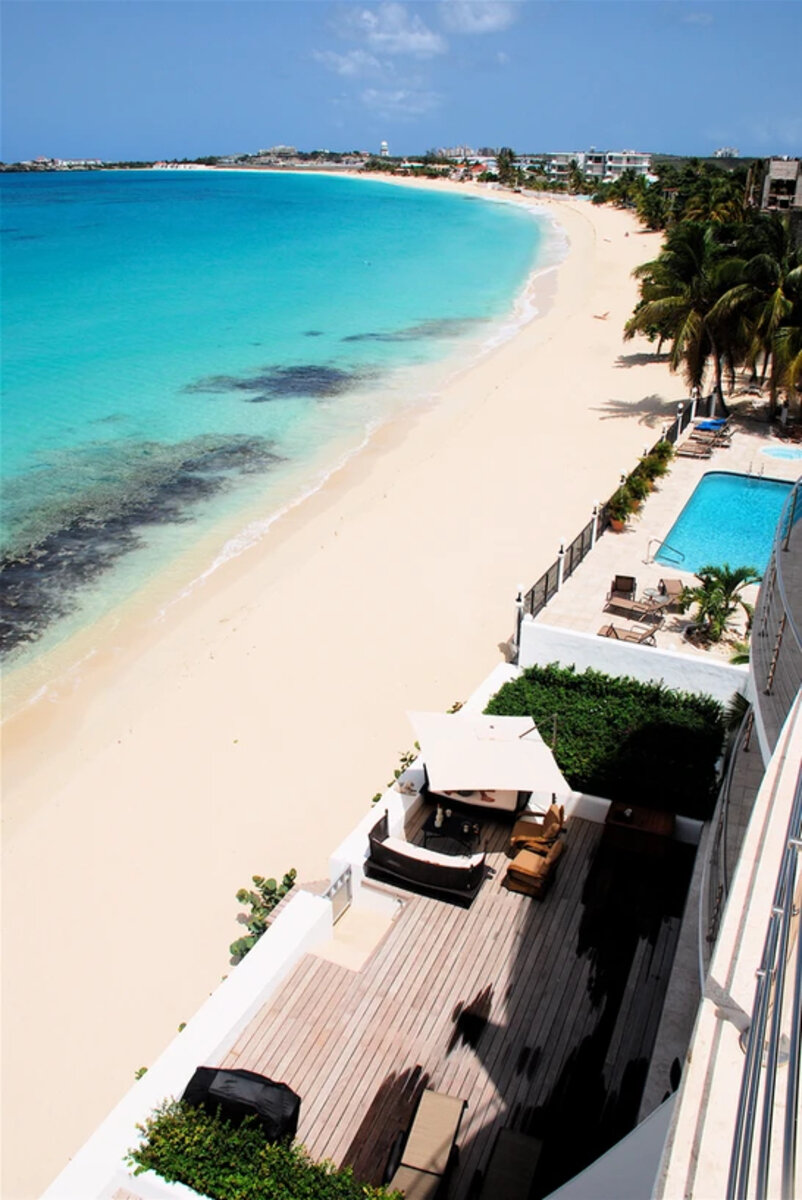 Luxury Beachfront Living at Aqualina Beach Club