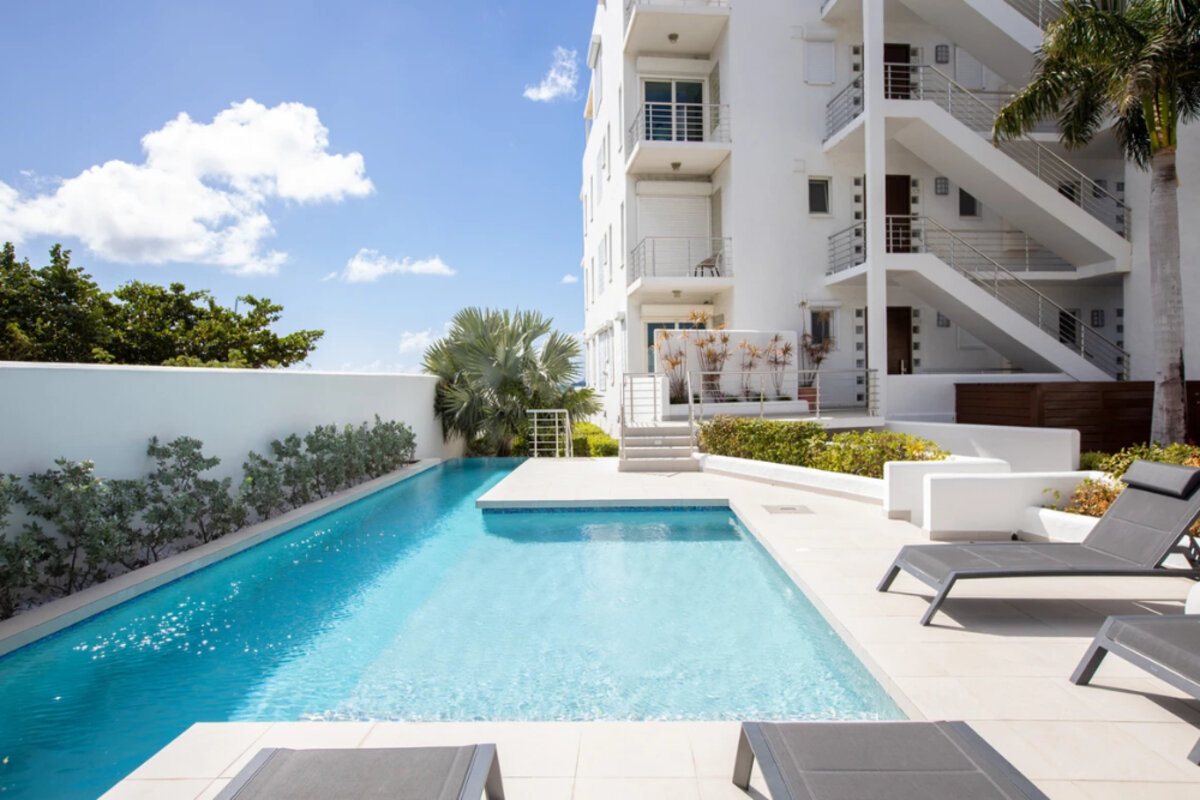 Luxury Beachfront Living at Aqualina Beach Club